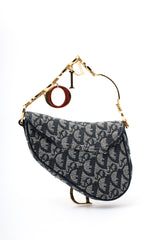 Dior Monogram Mini Saddle Wristlet Bag