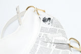 Dior Newspaper Print Saddle Bag
