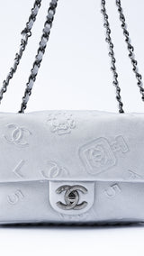 Chanel Lambskin Leather Embossed Symbols Classic Flap Bag