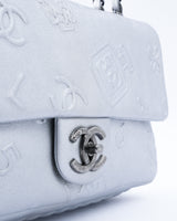 Chanel Lambskin Leather Embossed Symbols Classic Flap Bag