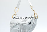 Dior Newspaper Print Saddle Bag