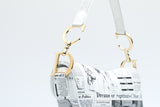 Dior Newspaper Print Saddle Bag