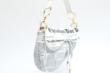 Dior Newspaper Print Saddle Bag